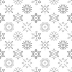 Seamless pattern with beautiful New Year and Christmas snowflakes. Design and textiles.
