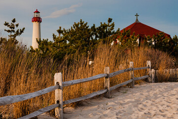 Path to the Cape May Point Lighthouse, Cape May, New Jersey. - obrazy, fototapety, plakaty