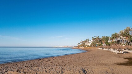 Landscape on the beach with sea and blue sky. Marbella, Spain.