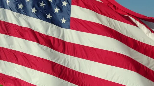 Starts and stripes American flag waving in the breeze 4th of July