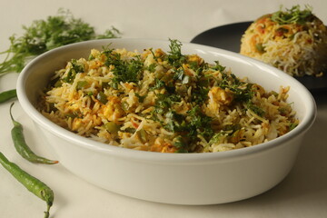 Steamed basmati rice tossed with a semi dry gravy of cottage cheese and bell peppers. Commonly known as Paneer rice in India.