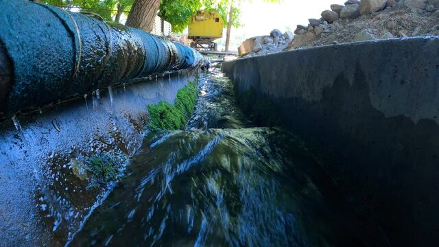 Water flowing in a ditch on the way to Badak Lake, June 2021