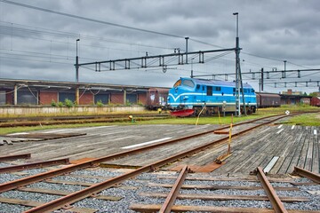 Fototapeta na wymiar Old blue train in Värnamo (HDR) 
