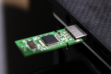 Data recovery from flash drive and NAND component. Flash drive component being plugged into a...