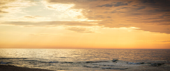Naklejka na ściany i meble View on landscape of sunset at beach. Travel concept