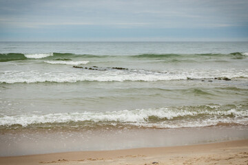 View on beach and sea with waves. Travel concept