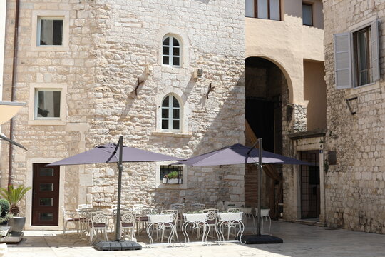 Scenic view of  street in the old town. Man ad woman together sightseeing old city in Split, Croatia