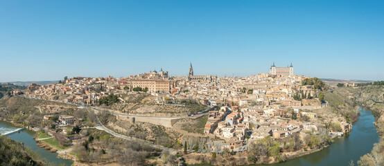 Fototapeta na wymiar Panoramic image of the medieval city of Toledo with the Tagus river surrounding it