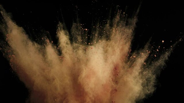Super slow motion of colored powder explosion isolated on black background. Filmed on high speed cinema camera, 1000fps.