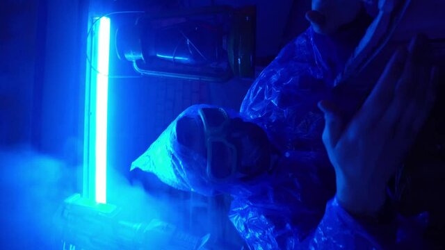 Cyberpunk future concept. People are talking to each other in night city with neon lighting. Science fiction scene, fantasy, sci. On set. World of tomorrow. Radiation, dangerous area