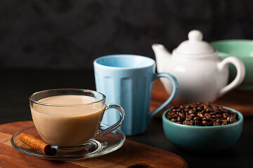 Cup of coffee with creamy milk.