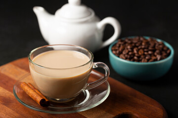 Cup of coffee with creamy milk.