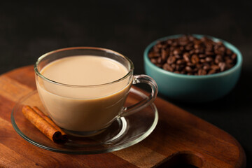 Cup of coffee with creamy milk.