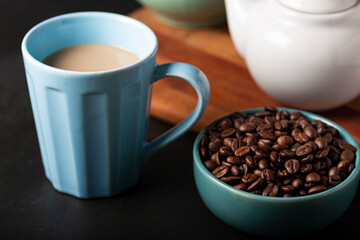 Cup of coffee with creamy milk.