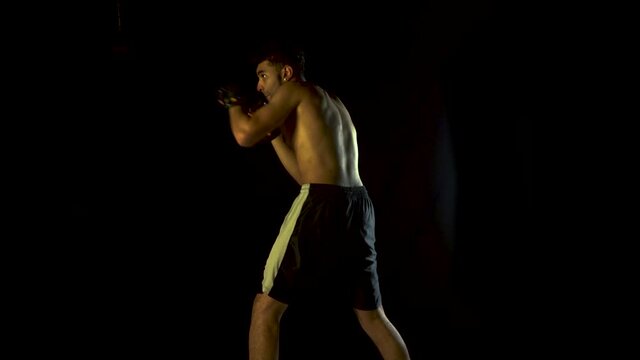 Male Boxer MMA Athlete Strong Fighter in Dark Background