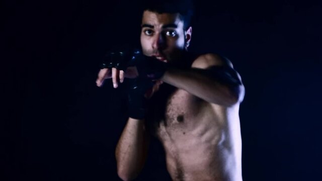 Male Boxer MMA Athlete Strong Fighter in Dark Background