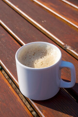 Coffee cup on wooden table