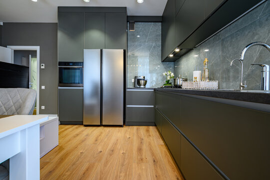 Modern large luxury dark gray kitchen