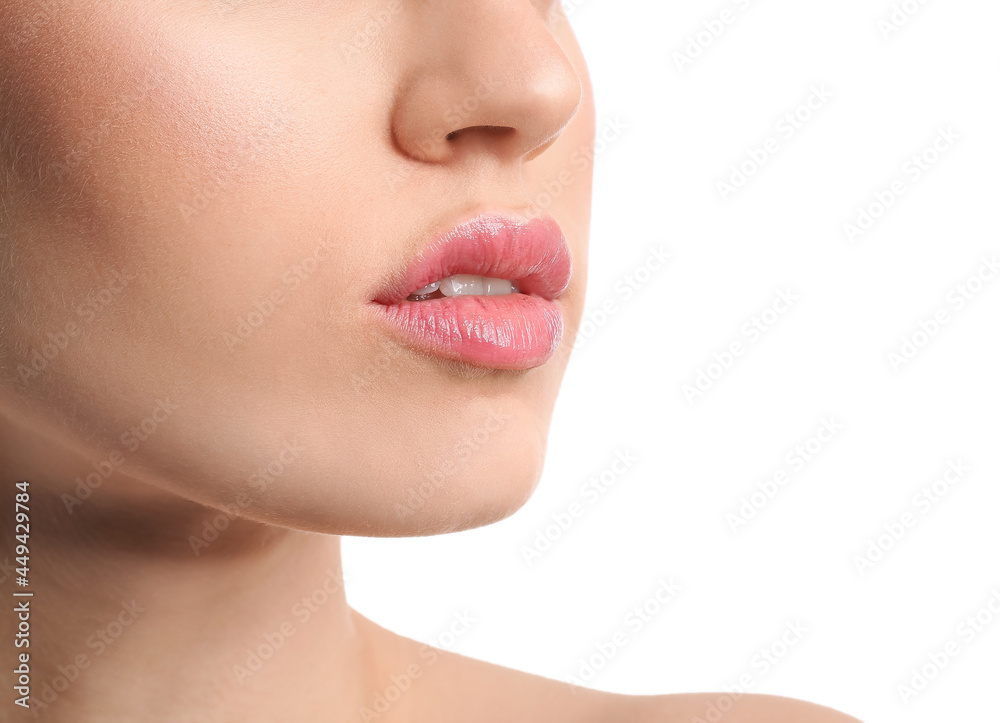 Poster Young woman with beautiful lips on white background, closeup