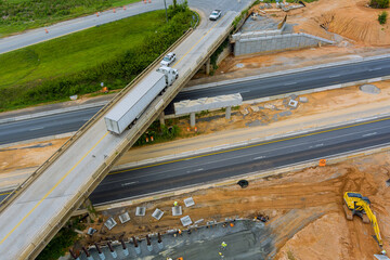 Overhead view of under construction works in highways of a bridge over a 85 interchange road