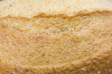 Roasted Bread texture background. Loaf Bakery concept. Close up, macro photo. Beautiful natural wallpaper.