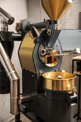 Modern roaster for coffee beans indoors
