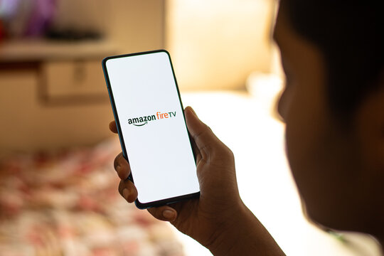 Assam, india - June 21, 2021 : Amazon fire tv logo on phone screen stock image.
