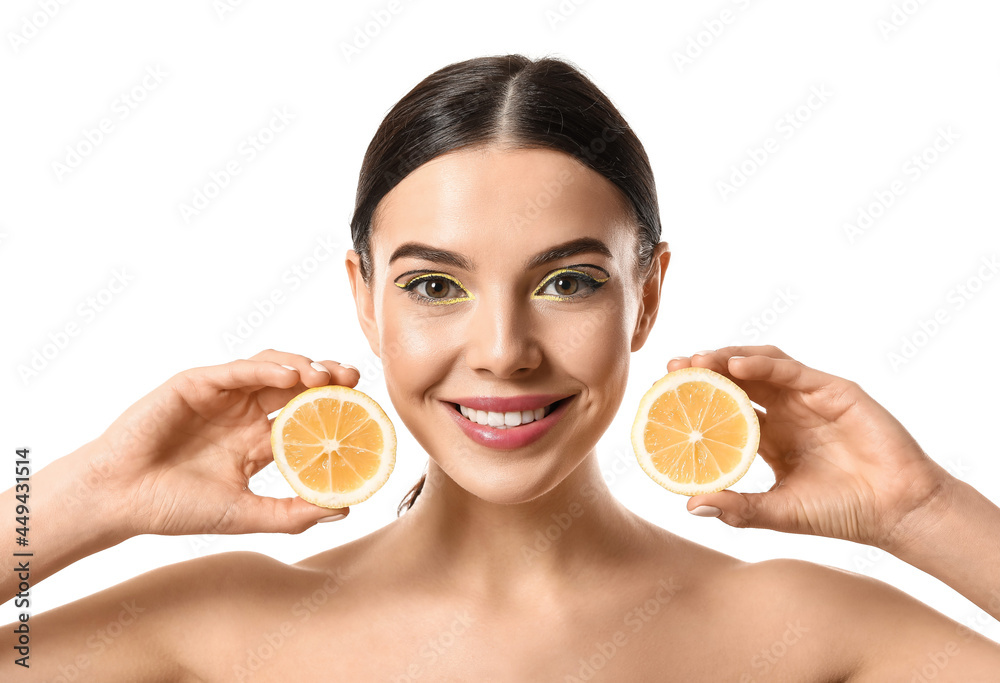 Canvas Prints beautiful young woman with lemon on white background