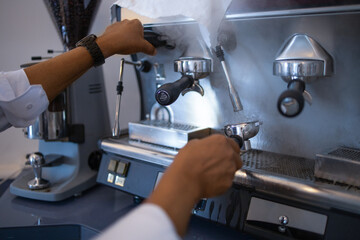 Waiter preparing cafe in the morning for hotel guest