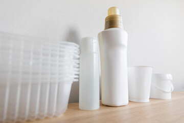 Different types of plastic package in everyday life. Bottles cleaned from labels and prepared for separate collection of garbage. Shot from below, concept of the power and prevalence of the palstic