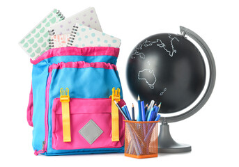 School backpack, globe and stationery on white background