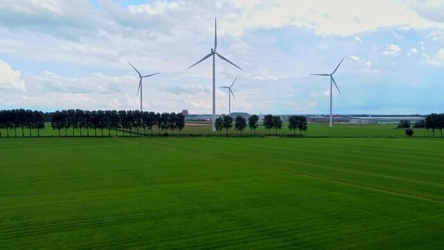 Aerial drone footage of wind turbines in The Netherlands, Green landscape with wind turbines, Dutch wind turbines 