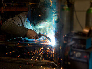 welder working at steel construction