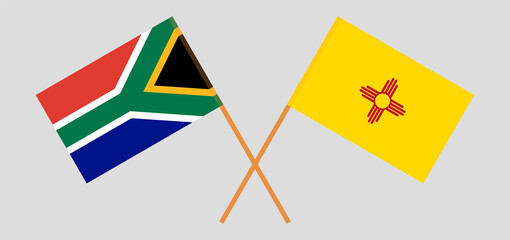 Crossed flags of Republic of South Africa and the State of New Mexico. Official colors. Correct proportion