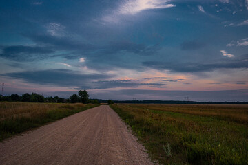 Fototapeta premium Graveyard in the village in the evening in summer