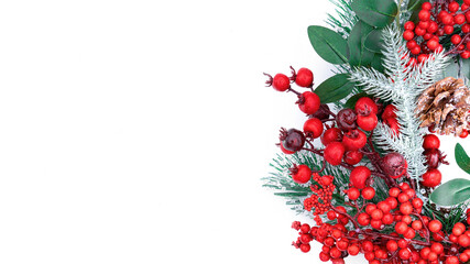 Christmas banner with traditional wreath with red berries on a white background. Design template for a merry christmas greeting card.