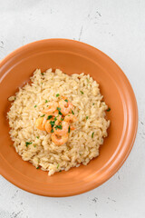 Portion of risotto with prawn