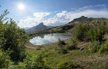 Fototapeta na wymiar Mountain lake .Crimea.Mount Khaturlanyn-Burun, the village of Mezhdurechye .