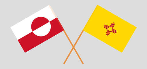 Crossed flags of Greenland and the State of New Mexico. Official colors. Correct proportion