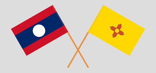 Crossed flags of Laos and the State of New Mexico. Official colors. Correct proportion