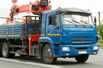 Freight transport on the highway. A vehicle to transport goods in the flow of cars.
