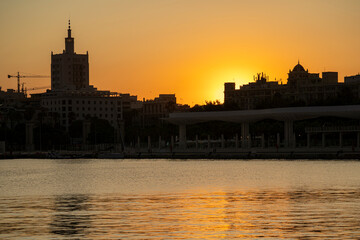 Fototapeta na wymiar Views of Malaga city during sunset on a sunny summer day 