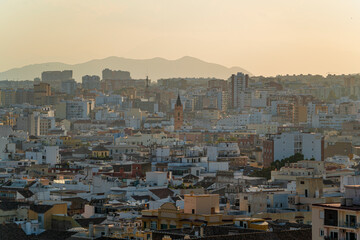 Views of Malaga city during sunset on a sunny summer day