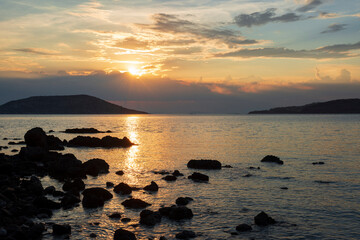 Fototapeta na wymiar sunset on anavyssos beach in athens greece
