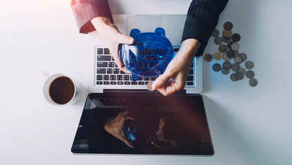 Businesswoman use laptop ,analytics and financial and bank technology concept, chart from computer...