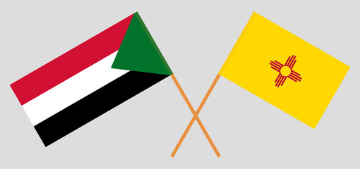 Crossed flags of the Sudan and the State of New Mexico. Official colors. Correct proportion