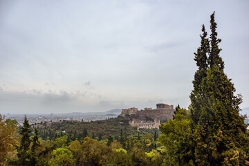 Acropolis hill (Parthenon, Propylaea, Temples, Odeon of Herodes Atticus) and white city view...