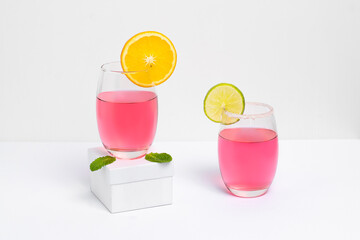  two glasses with pink lady cocktail photogarafado on white background