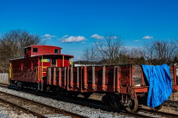 Obraz premium Caboose and Open Freightcar, Northern Central Railroad, New Freedom, Pennsylvania, USA