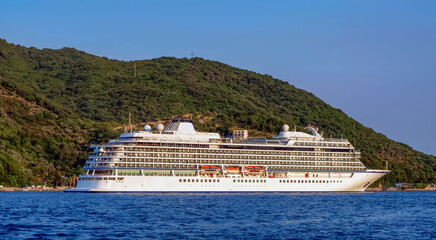 Сruiser is going along the Mediterranean coast.